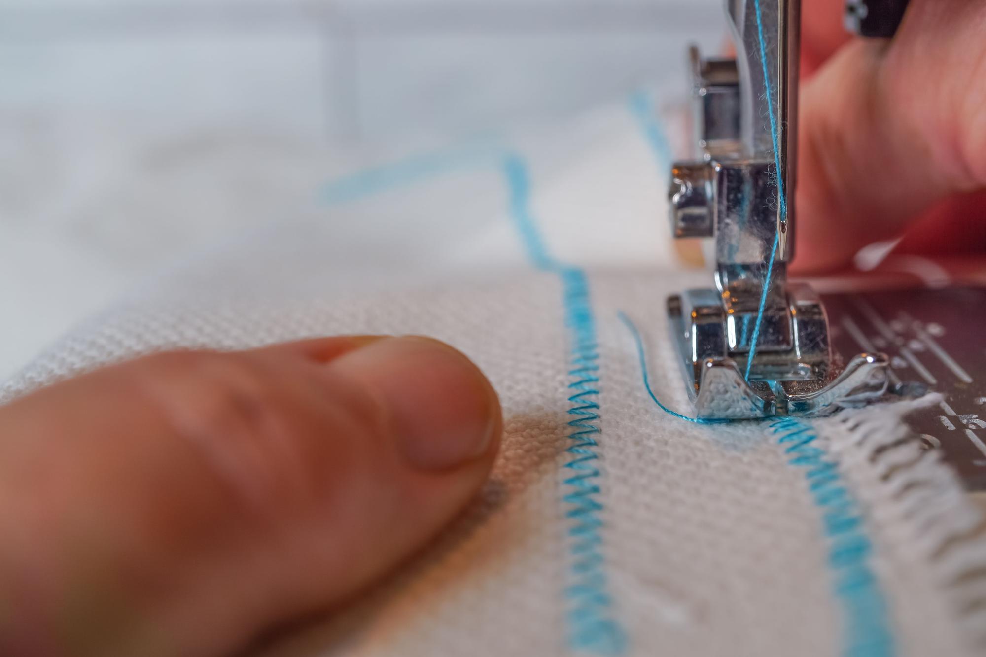 Close-up of embroidered textile with precise stitches